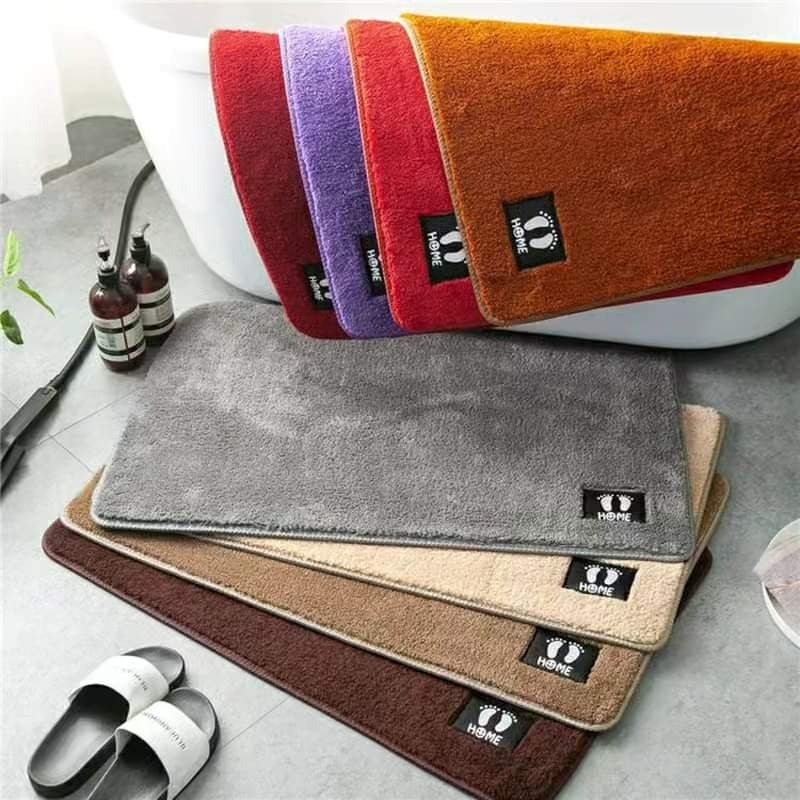 Absorbent door mats